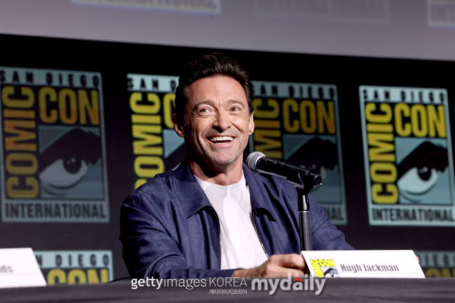 SAN DIEGO, CALIFORNIA - JULY 25: Hugh Jackman speaks onstage during Marvel Studios: The Ultimate Deadpool & Wolverine Celebration of Life in Hall H at SDCC in San Diego, California on July 25, 2024. (Photo by Jesse Grant/Getty Images for Disney)