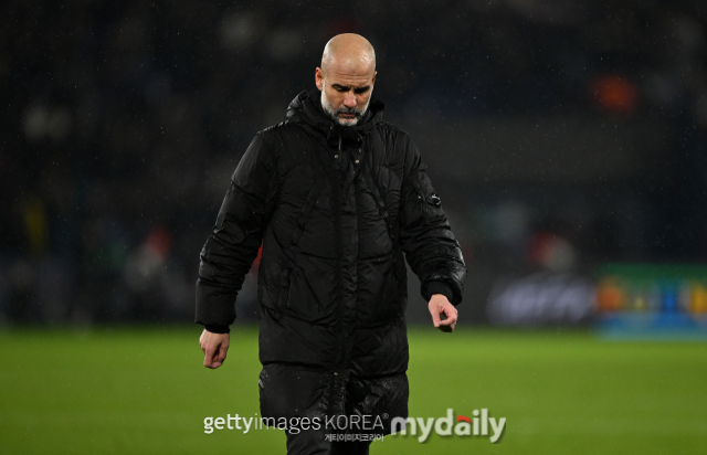 펩 과르디올라 맨시티 감독이 23일 PSG와 UEFA 챔피언스리그 원정 경기에서 패한 뒤 낙담하고 있다. /게티이미지코리아