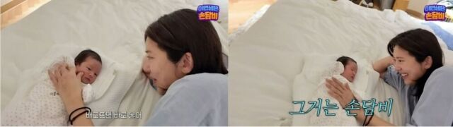가수 손담비가 자신의 딸 해이를 바라보고 있다./손담비 유튜브 캡처